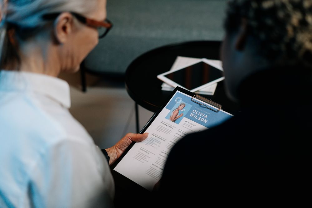 Resume writing in progress on a desk